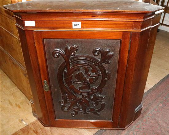 Carved corner cupboard